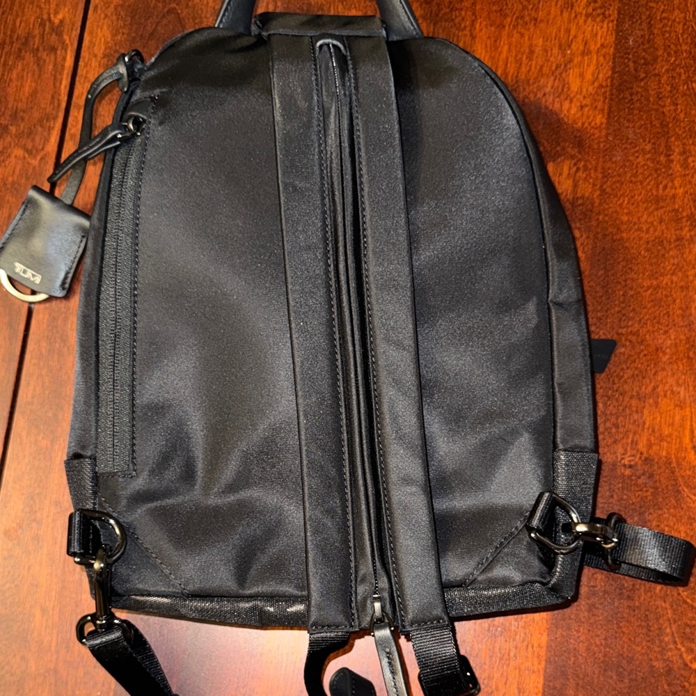 NWOT RARE TUMI Monett Black Camo mini sling backpack - Picture 8 of 9